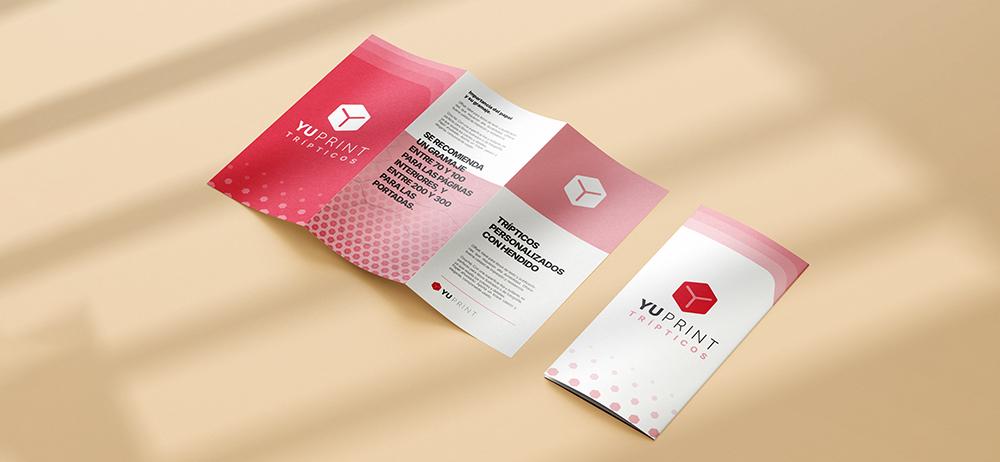 Tríptico publicitario Yuprint con portada moderna en rojo y contenido interior profesional para empresas.