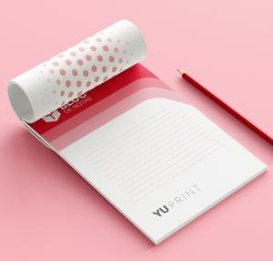 Bloc de notas Yuprint abierto con diseño limpio y páginas rayadas, perfecto para apuntes diarios.