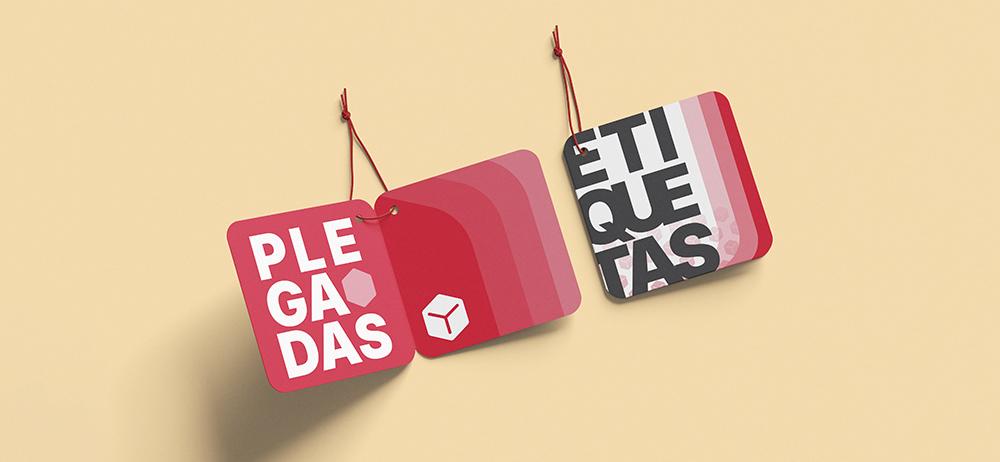 Etiquetas plegadas Yuprint en formato cuadrado, diseño moderno en rojo ideales para ropa y regalos.